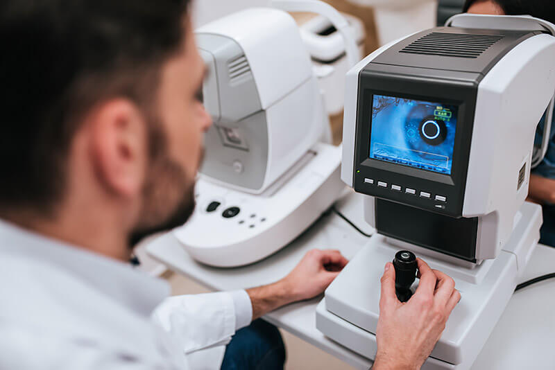 Ophthalmologist Scanning a Patient for Glaucoma